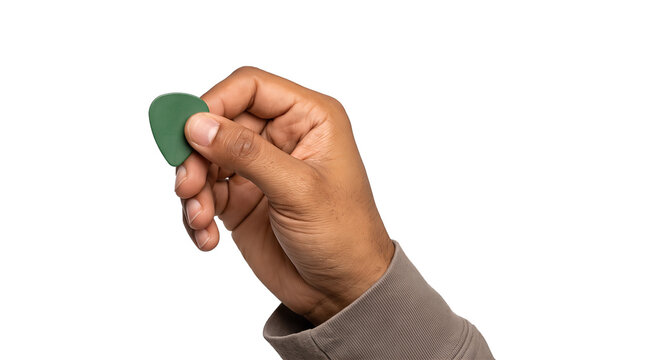 Guitar pick in green held by a hand in a gray sleeve shown as a PNG isolated on a transparent background