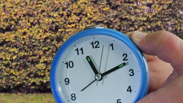 Setting a clock back one hour for winter time on the last sunday in october