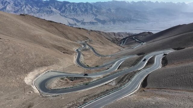 winding panlong ancient road in xinjiang mountains