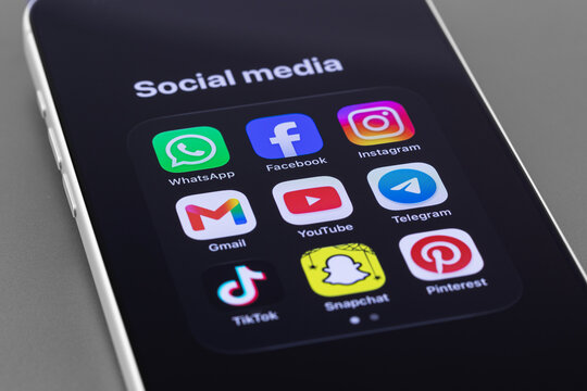 smartphone iPhone with popular social media mobile icon apps WhatsApp, Facebook, Instagram, Gmail, YouTube, Telegram, Pinterest, TikTok, Snapchat. Batumi, Georgia - October 3, 2026