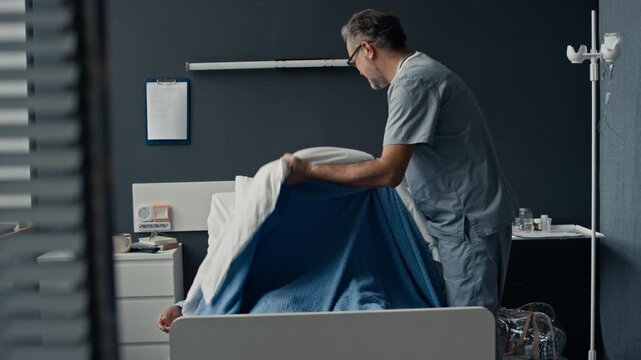Middle aged Caucasian nurse tucking smiling middle aged Caucasian patient into hospital bed. Suitable for hospital advertising, medical campaigns, and patient care promos