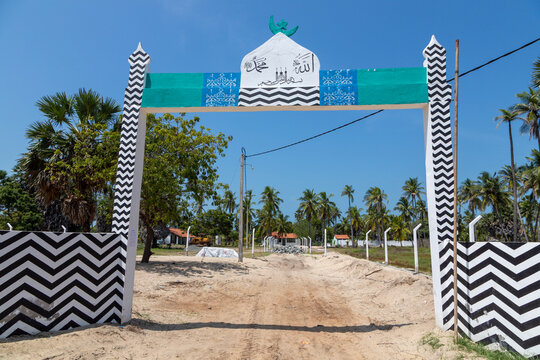 Painted entrance gate of the Muslim cemetery with the tomb of Adam and Eve, Northern Province, Mannar, Sri Lanka