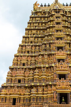 Ornate carved upper tiers of the Nallur Kandaswamy Kovil gopuram, Northern Province, Jaffna, Sri Lanka