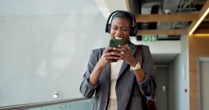 Dancing, headphones or black woman in office with phone, goodbye or leaving work with music groove. Space, feel good or happy employee with farewell wave, fun time or upbeat movement at end of day.