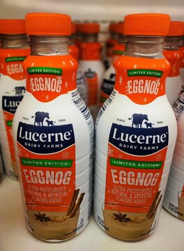 Wilmington, Delaware, U.S.A - Oct 13, 2026 - Two bottles of Lucerne Dairy Farms limited edition ultra-pasteurized eggnog arranged on a chilled supermarket shelf