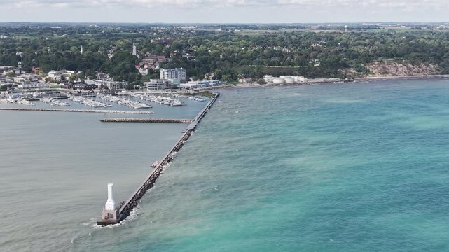 Port Washington, Wisconsin - 23 September 2026: Aerial view of the harbor, marina, and lighthouse along the Lake Michigan coastline.