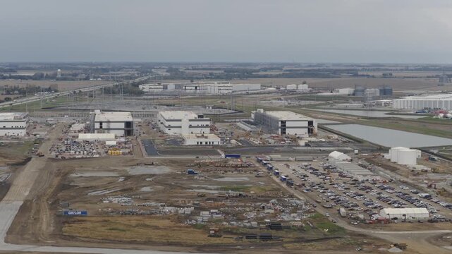 Aerial view of hyper scale data center and building centers with electrical substation and construction by interstate 71 i71 highway between Columbus and Cincinnati Ohio for big technology company AI