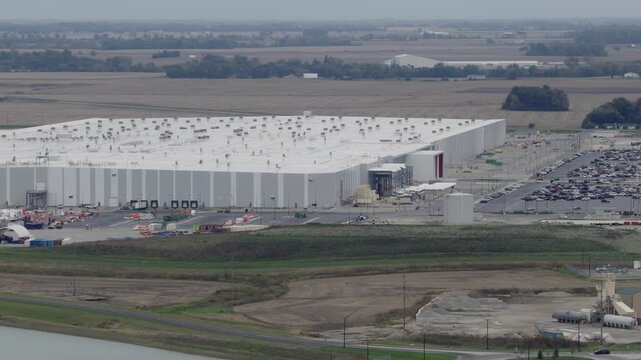 Aerial view of hyper scale data center and building centers with electrical substation and construction by interstate 71 i71 highway between Columbus and Cincinnati Ohio for big technology company AI