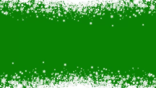 Magical glowing sparkle particles and dynamic falling snowflakes border animation on green background for winter holiday video editing overlays