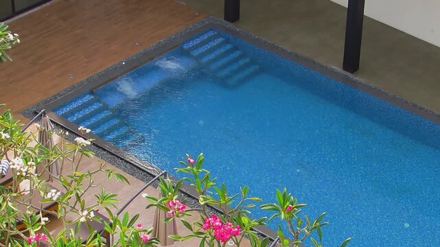 Luxury swimming pool with blue water