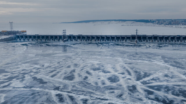 Frozen Hydroelectric Dam and Reservoir in Russia