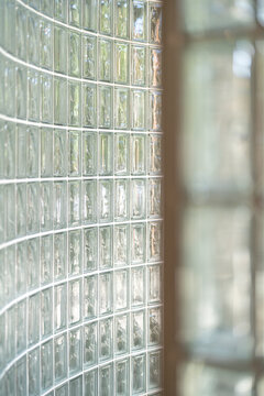 Curved glass block wall in modern interior