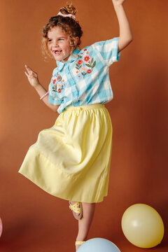 Kids fashion: little girl dancing