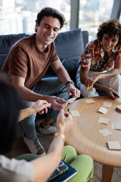 Small team having fun during creative brainstorming workshop
