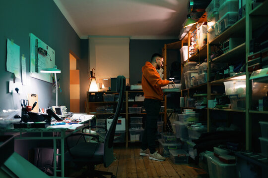 Electronics Student Working Late in Electronics Workshop