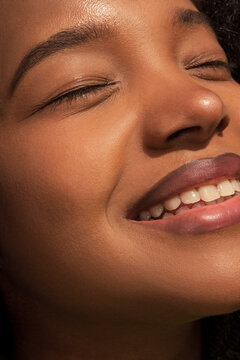 Smiling face in warm summer sunlight