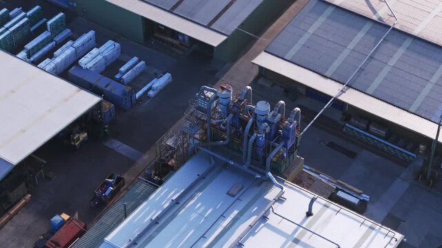 Melbourne, VIC, Australia - 04 October 2026: Aerial view of Kilsyth South industrial factory rooftops with ventilation systems and storage yards.