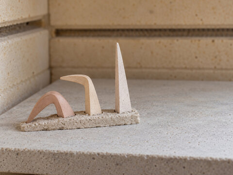 Minimalist abstract stone sculpture in beige and pink tones