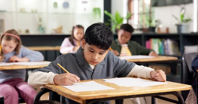 Education, kid and writing on exam paper in classroom for academic assessment, knowledge or quiz. Test, student learning and boy in middle school for development, study and multiple choice answers
