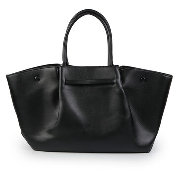 Black pebbled tote handbag with long handles, broad side panels and a narrow horizontal front detail, photographed straight on as a minimalist studio product on white.