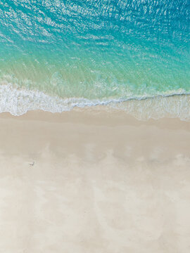 Aerial view of Whitehaven Beach with turquoise water and white sand, Whitsundays, Queensland, Australia.