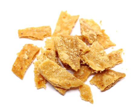 Close up image of golden crispy food flakes