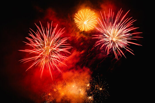 Fireworks lighting up the night sky. Pyrotechnics, abstract	