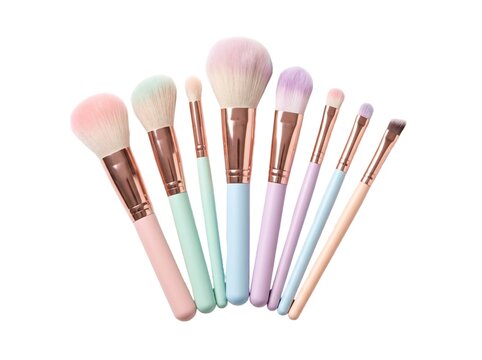 Professional makeup brushes with colorful pastel handles arranged neatly against a clean white background