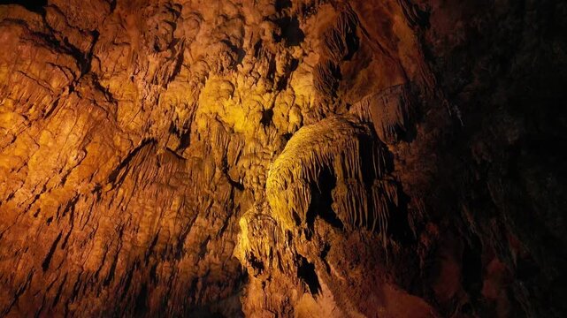 Limestone cave interior with glowing rock formations