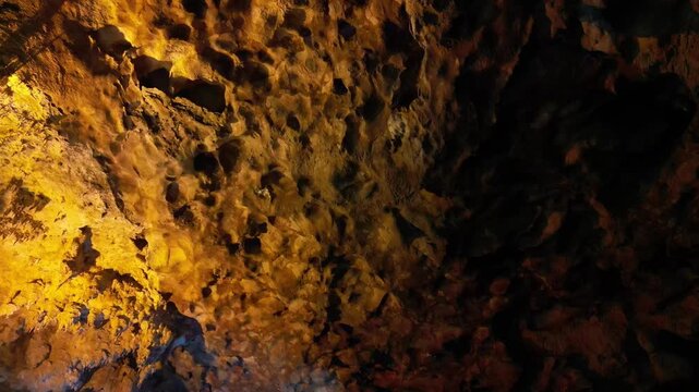 Limestone cave ceiling with warm lighting