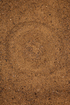Round circle drawn in sand texture