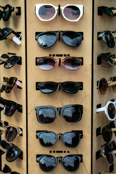 Wooden display stand with sunglasses