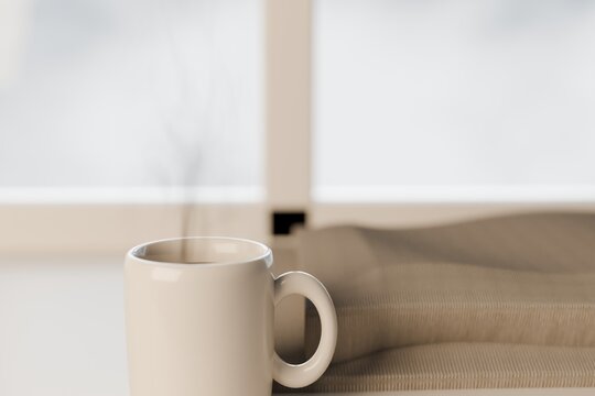 Steaming mug and wool blanket by a winter window