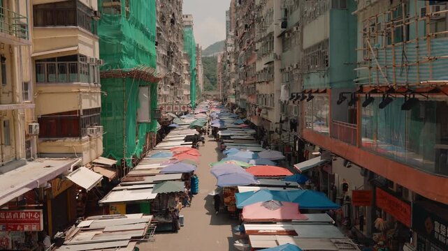 Busy street market on Fa Yuen Street in Mong Kok, Hong Kong, with outdoor stalls and shoppers - 10 September 2026.