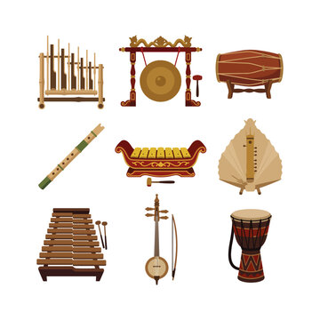 Set of nine traditional Indonesian musical instruments including gong, angklung, gamelan, bamboo flute, rebab, sasando, kolintang and tifa drum, flat vector illustration isolated on white background