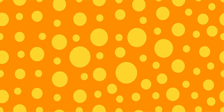 Yellow polka dots on a light orange background create a cheerful seamless pattern for wallpaper, fabric, packaging, and decorative design.