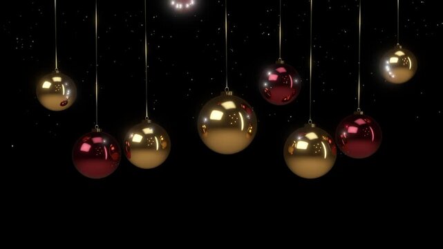 Red and gold Christmas baubles dropping in on golden strings and swaying with twinkling sparkles on black