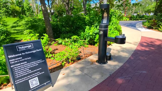 Huizenga Park rules sign pan to reveal garden scene