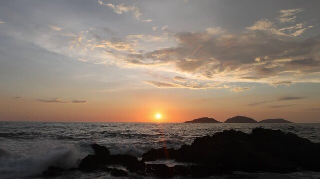 Mazatlan beaches, sunsets and scenic slow motion ocean swells and waves near Malecon sea promenade
