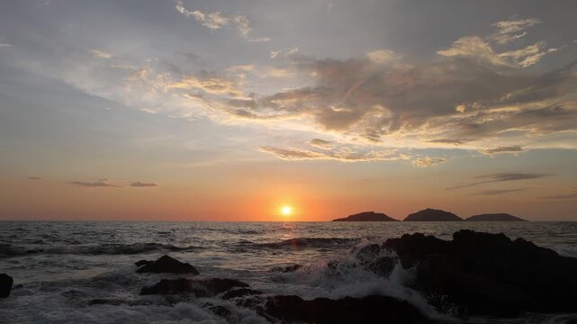 Mazatlan beaches, sunsets and scenic slow motion ocean swells and waves near Malecon sea promenade