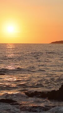 Mazatlan beaches, sunsets and scenic slow motion ocean swells and waves near Malecon sea promenade