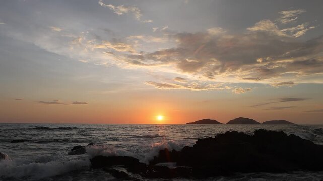 Mazatlan beaches, sunsets and scenic slow motion ocean swells and waves near Malecon sea promenade