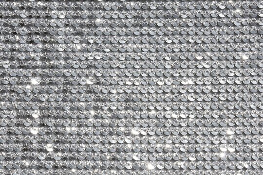 Silver sequin fabric with sparkling metallic rows