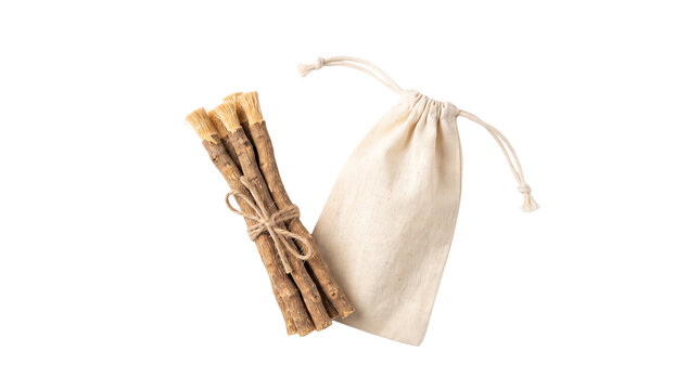 Natural miswak sticks tied with jute rope, organic siwak toothbrush with cotton pouch, traditional herbal dental care tools on white background
