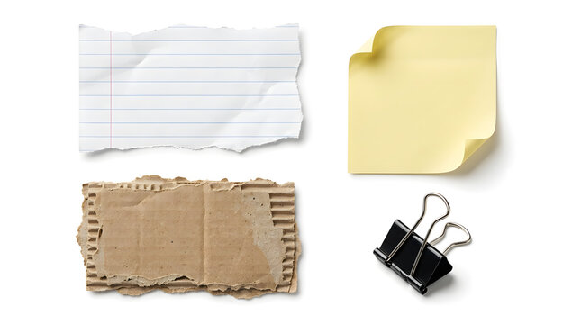 Collection of torn lined paper yellow sticky note cardboard scrap and metal binder clip on white