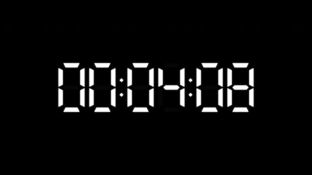 White digital numbers on a dark black background show fast ticking clocks simple watch movements. these multiple glow timers display rapid changes.