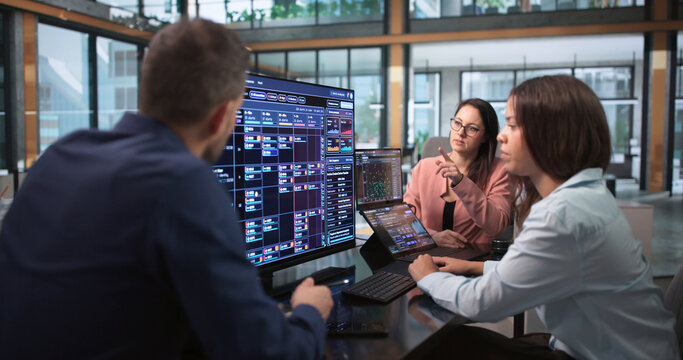 Security Analyst Carefully Monitors Cyber Threat Alerts