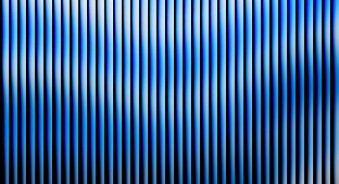 Vertical blue stripes with gradient shadows and light reflections
