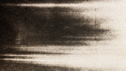 Cinematic film grain texture with soft light leaks, vintage analog photography aesthetic on dark...
