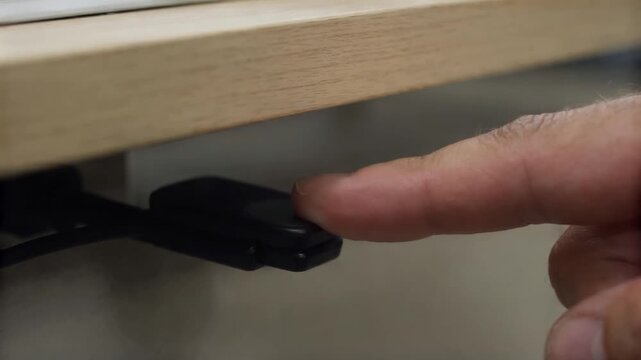 Thumb touching a standalone fingerprint sensor